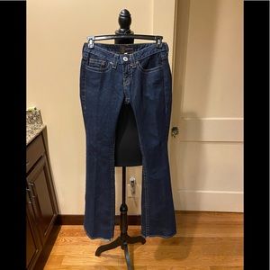 Bebe Kayla Dark Wash Chain Link Jeans.